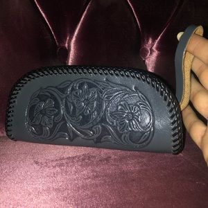 Grey tooled leather zip-up clutch w black accents